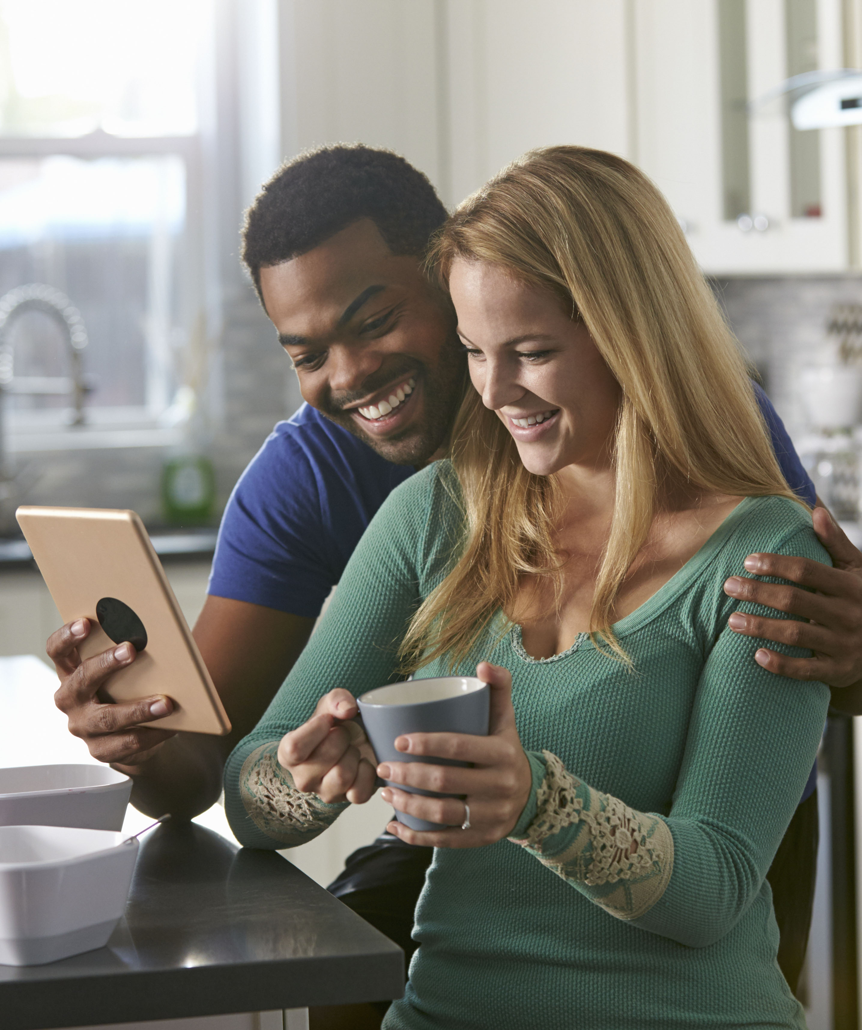 couple looking at tablet pharmacy